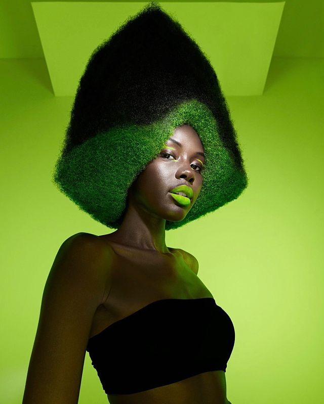 Sculpted textured hair on green backdrop